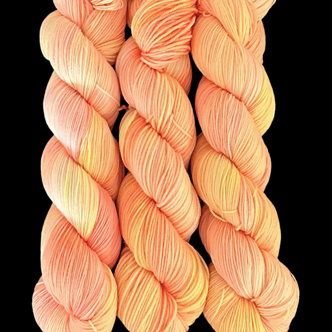 Orange Sherbet - A variegated hand dyed yarn